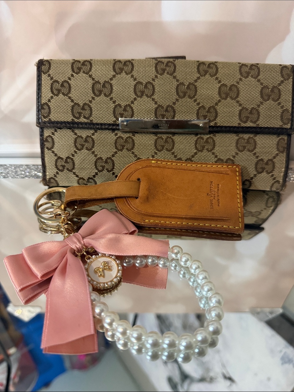 $10 start for @onlyfancybags show 3 items Gucci Wallet - LV tag -keychain